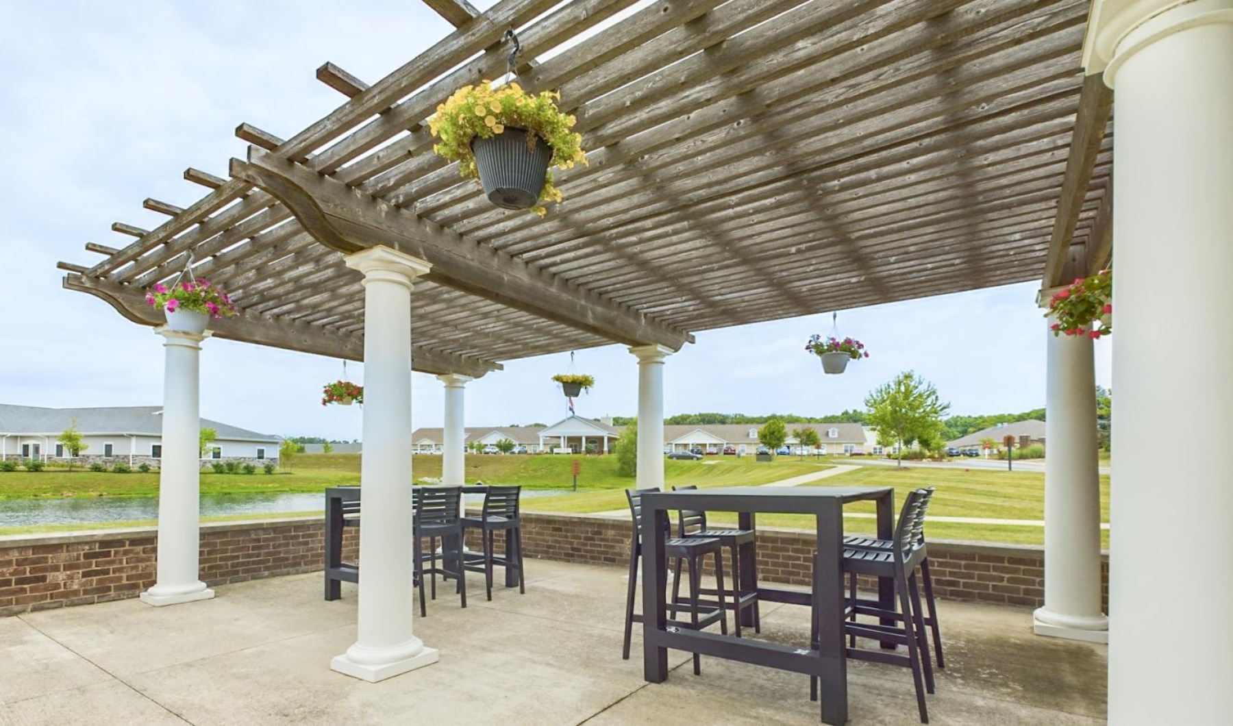 Enjoy our resident-only features a table and chairs under a covered area