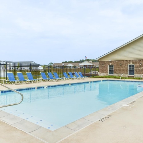Shimmering resort-style pool a swimming pool outside a building